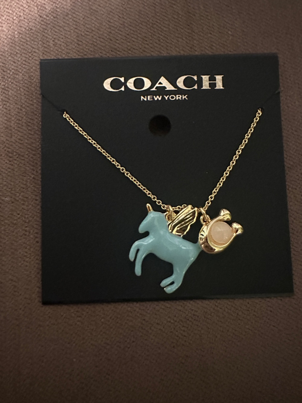 Coach Gold-Tone Necklace with Light Blue Enamel Unicorn Charm
